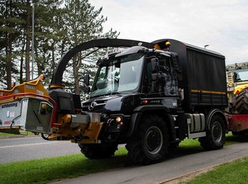 Mercedes Unimog U429 towing Menzi Muck Excavator